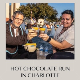 a couple holding drinks