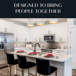 a kitchen with white cabinets