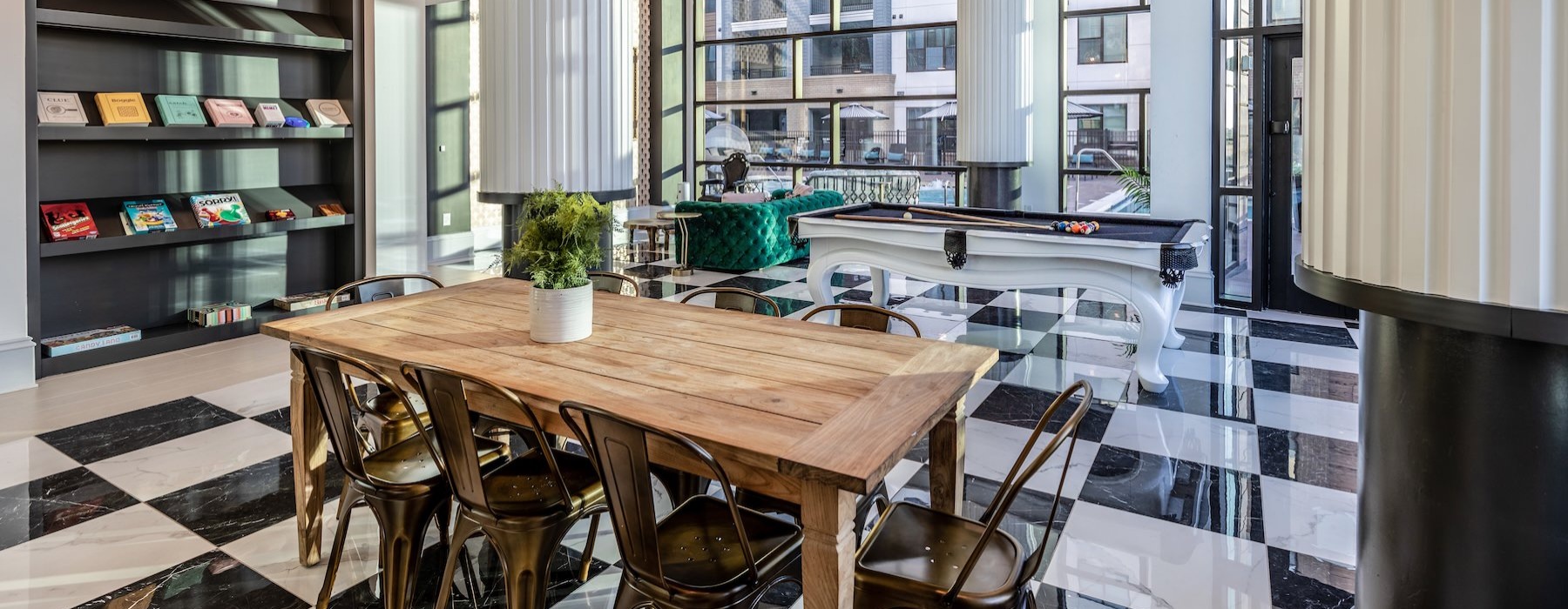 a room with a table and chairs