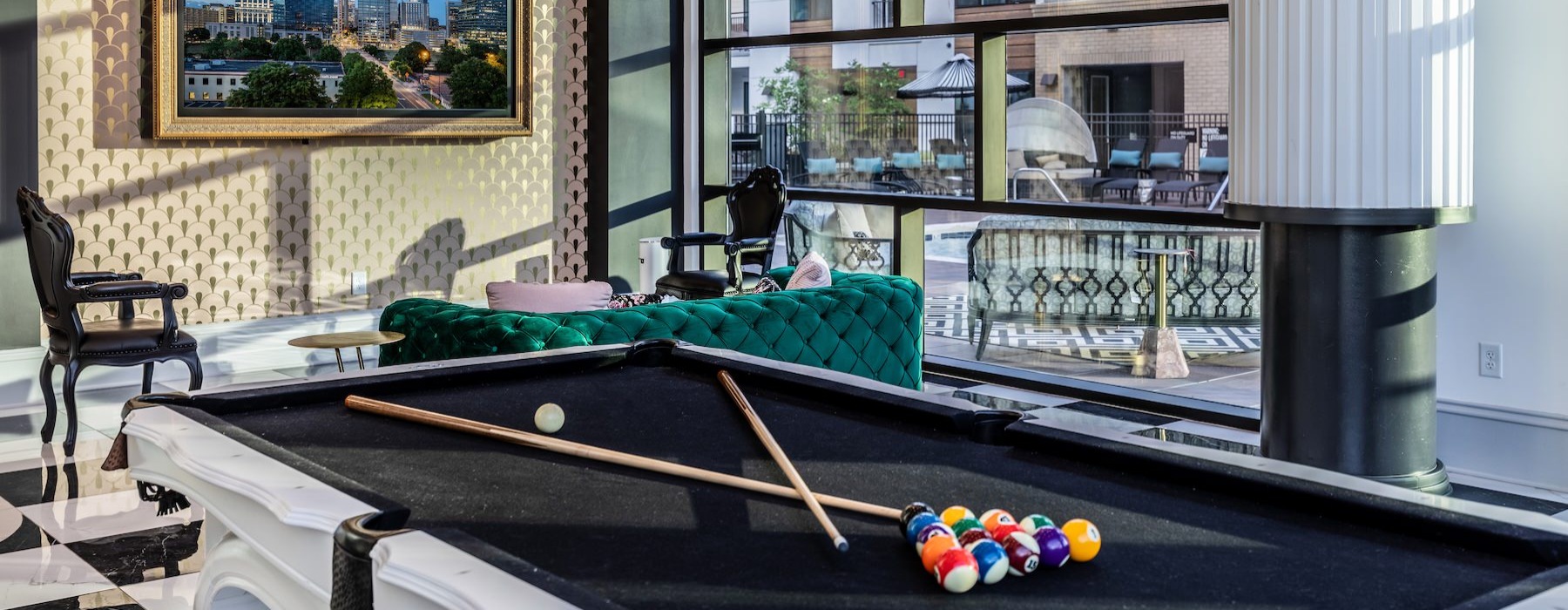 a clubroom with a pool table