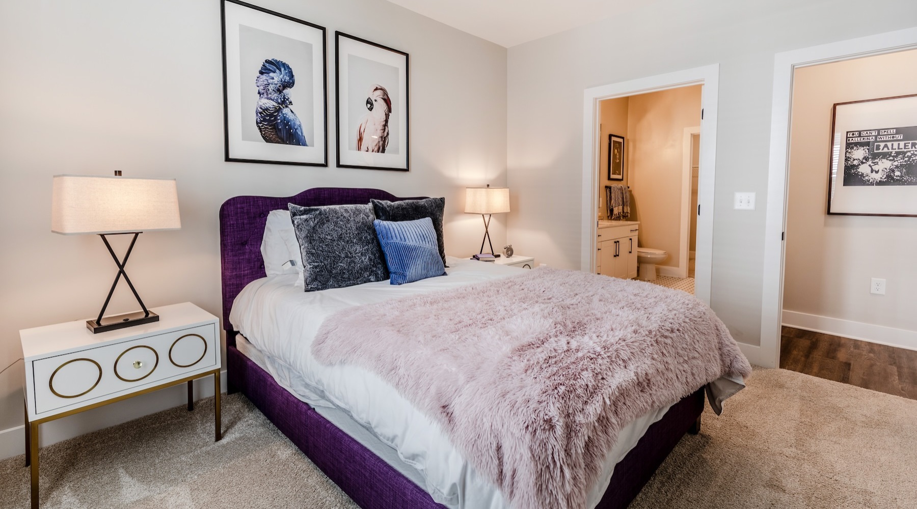 a bedroom with a bed and two nightstands