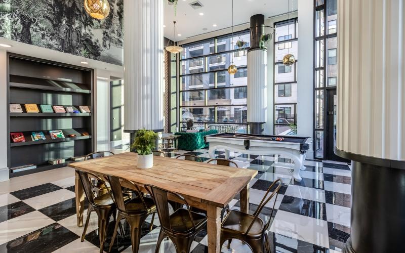 a room with a table and chairs
